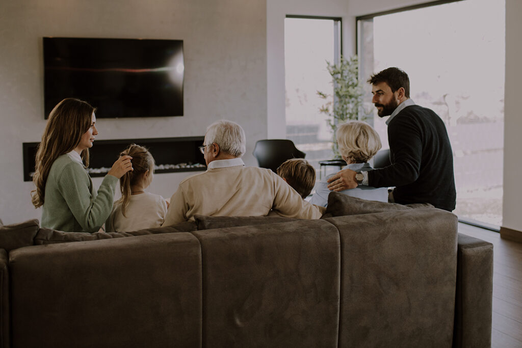 Family discussing probate questions with estate planning attorney for real estate law solutions