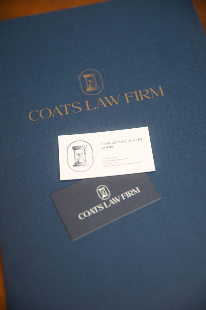 Coats Law Firm folder and business cards for estate planning attorney Cassandra Coats.